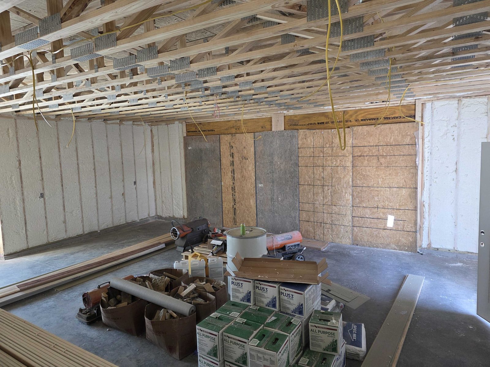 Sealing the roofline with spray foam creates a conditioned, energy efficient attic.