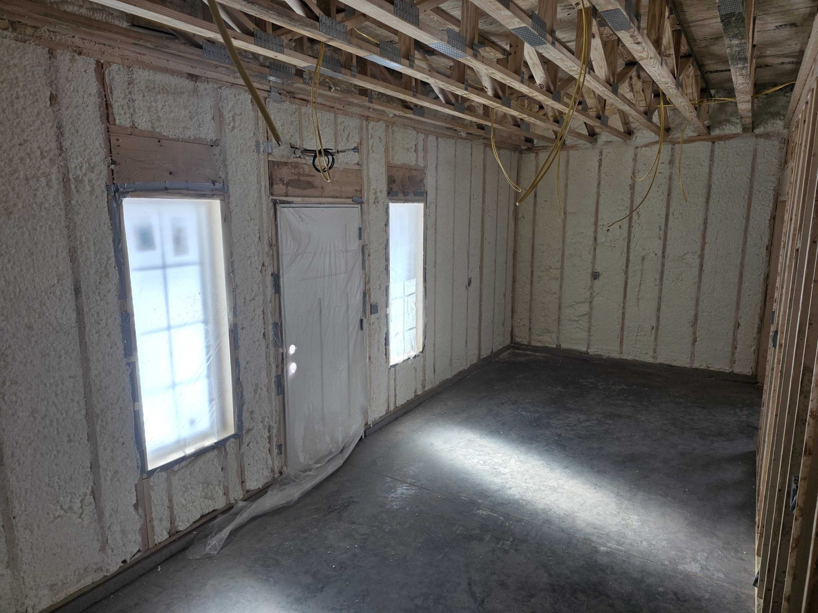 Open framing in a new build, ready for spray foam before the drywall goes up.